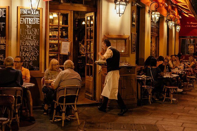 A Magical Evening in Paris With Locals: PRIVATE City Walking Tour - Champs-Élysées at night: a classic walk with real street energy