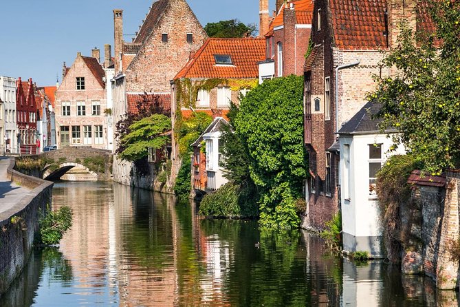 Bruges Guided Day Tour from Paris with Canal Cruise - Markt Square + Belfry: The City’s Center and the Frietkot Question