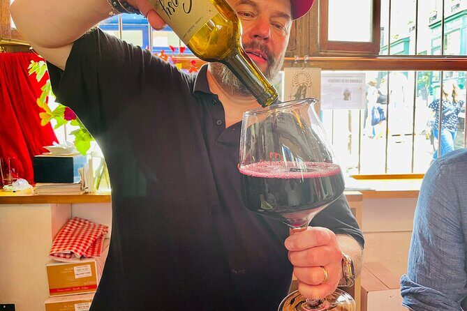 Chef PJ's Montmartre Food Tour - Stop One at Place de Clichy: The Moulin Rouge Photo Moment