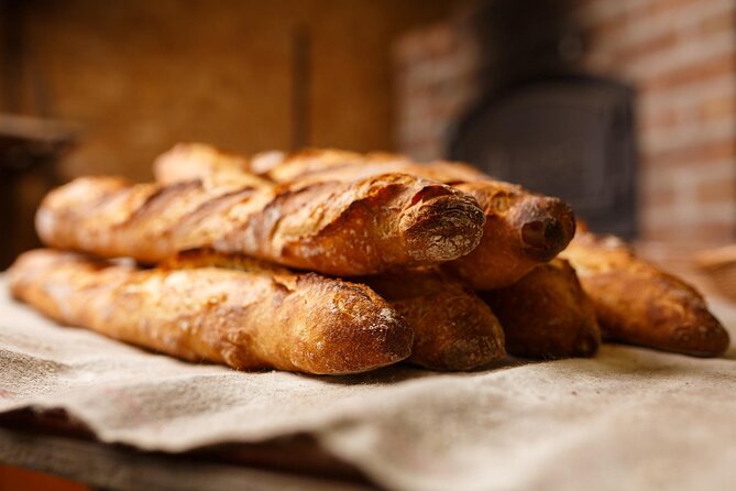 Custom private Paris food tour by walk from the Eiffel Tower - Bakery time on Rue Saint-Dominique: croissants, bread, and how it’s made