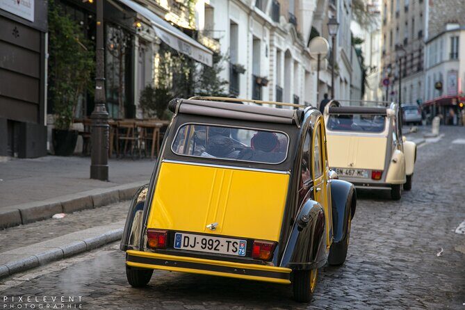 Discover Paris with a Local in his Unique Vintage Car - Arc de Triomphe and Champs-Élysées: seeing the city’s motion
