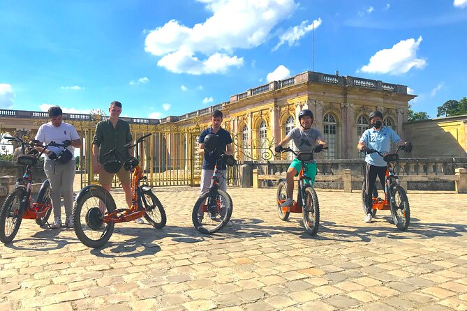 Discover Versailles on electric 2-wheelers (Yes to PRM) - Quartier des Antiquaires: old prison energy, now antique shops