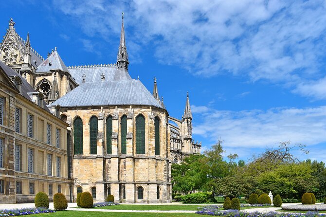 e-Scavenger hunt Reims: Explore the city at your own pace - Champagne-Named Stops: Taittinger and Krug in the Reims loop