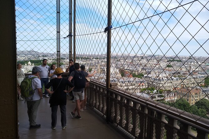Eiffel Tower Guided Tour by the Stairs up to Second Floor - Second level stop: where the city landmarks come into focus