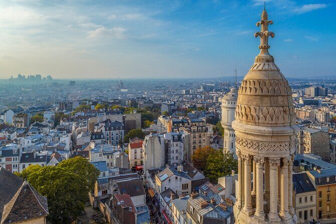 ESSENTIAL MONTMARTRE Walking Tour: the essential highlights+MORE! - Windmills at Le Moulin de la Galette: Art, Entertainment, and Everyday Life