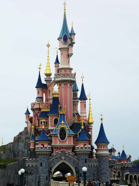 From Paris: Disneyland 1-Day Ticket & Private Transfer - Disneyland Park: Fairy Tales, Parades, Fireworks, and Garden Magic