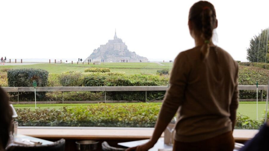 From Paris: Mont St Michel and Loire Valley 2 Day Tour - Entering Mont Saint-Michel Abbey: architecture and the guided pacing
