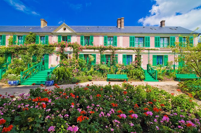 Giverny and Monet's House Half Day Trip from Paris Guide or Audio - Fondation Claude Monet Gardens: Front Orchards, Water Lilies, and the Bridge