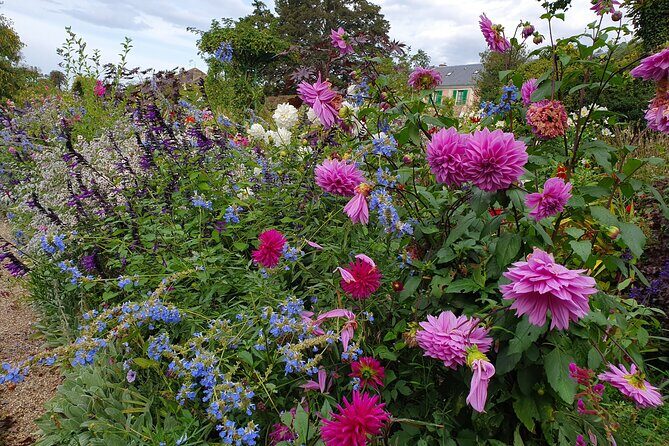 Giverny Half-Day Guided Tour from Paris - Clos Normand flower beds and the water-lily inspiration