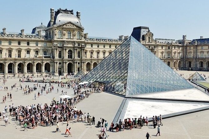 Half Day Paris Tour with Hotel pickup and drop - Louvre area focus: glass pyramid and 35,000 reasons
