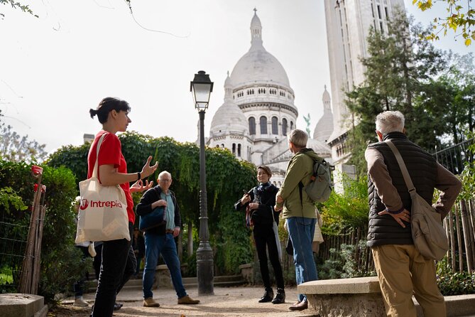 Hidden Montmartre: Paris' Secret Streets Walking Tour - Le Moulin de la Galette: Windmills, Expensive Streets, and a Secret Passage
