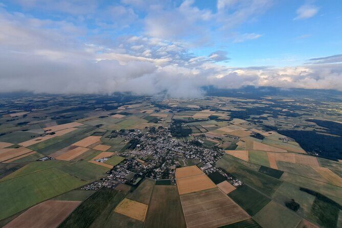 Hot air ballooning: Chambord, Blois, Chenonceau, Cheverny or Chaumont - Landing Like a Celebration: Breakfast, Sparkling Wine, Certificate, and Off-Road Ride Home
