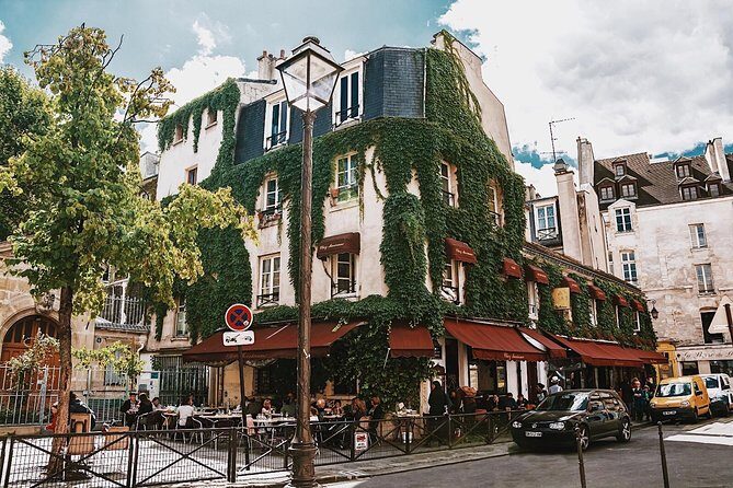 Le Marais District & Jewish Quarter - Exclusive Guided Walking Tour - Place des Vosges: The Classic Square That Still Feels Human
