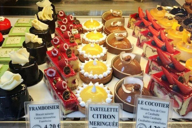 Le Marais Food Tour with a Local Guide: Private & Personalized - Le Marais first act: oldest market, crooked lanes, and art stops
