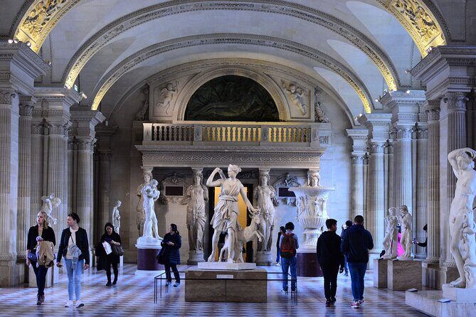 Louvre Late Opening Guided Tiny Group Tour - Two pre-museum stops: modern architecture and an iconic metro pause