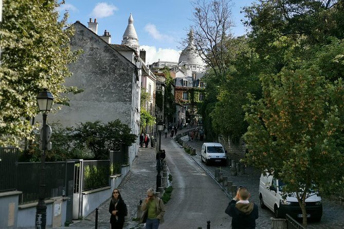 Montmartre and Sacre Coeur Private Guided Tour in Paris - Sacré-Cœur Basilica: The Hilltop Architecture Finale