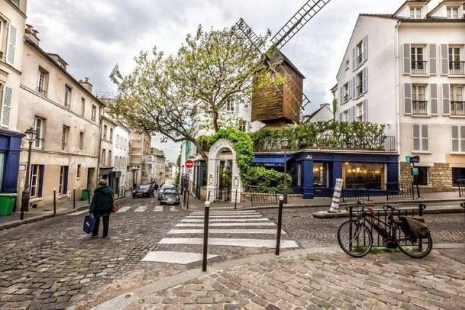 Montmartre Guided Tour with Sacré Cœur Church & City Views - Price and value check for $77.41
