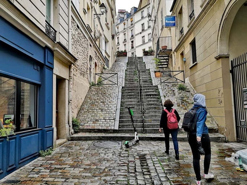 Montmartre : private family tour - Passe-Muraille, Le Consulat, and La Bonne Franquette: legends that stick