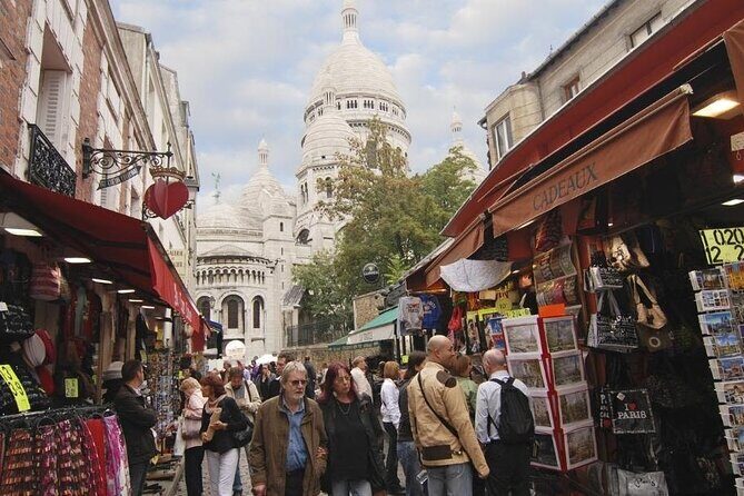 Montmartre Tour with a Local Guide: Private & 100% Personalized - Clignancourt and Porte de Clignancourt: the off-the-main-hill Paris angle