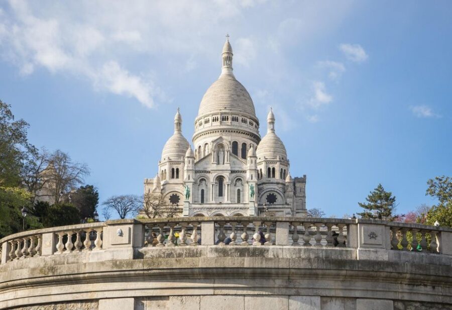 Montmartre Walking Tour in English - Café Deux Moulins: a movie-famous start with real neighborhood texture