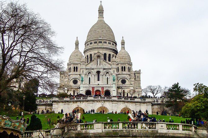 Montmartre Walking Tour with a Private Local Guide - Moulin Rouge area: vineyards, windmills, and the artists behind the myth