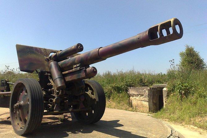 Normandy D-Day Landing Beaches Guided Tour from Paris by minivan - Pointe du Hoc: bunkers, craters, and the view across the channel