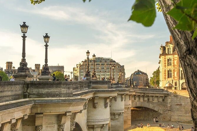 Notre Dame Outdoor and City Center of Paris with Local Guide - Palais de Justice and the Seine: Grand Facade to River Calm