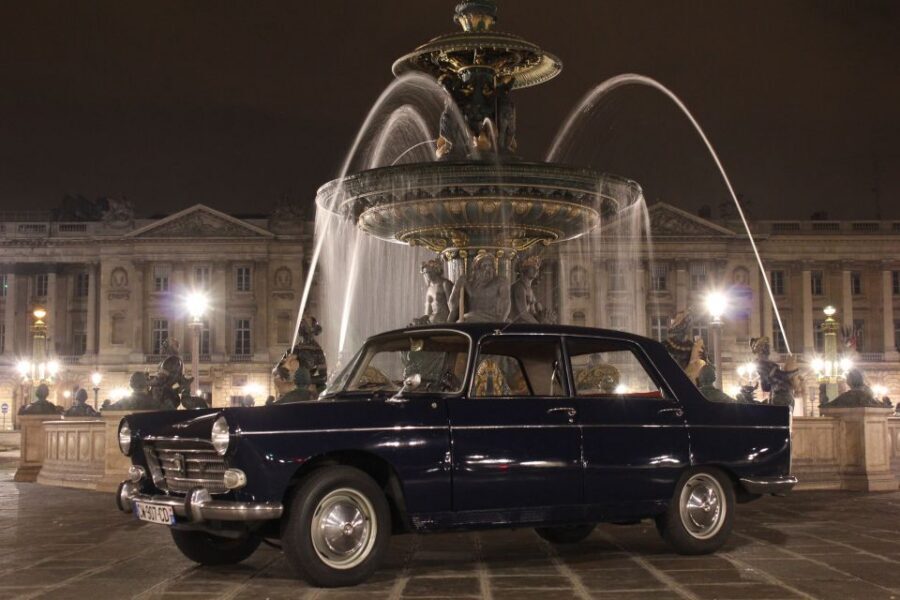 Paris: 1.5-Hour Vintage Car Night Tour - A 1963 Peugeot 404 turns Paris lights into a time machine
