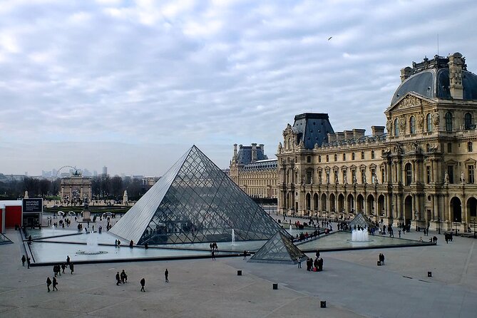 Paris 10-Hour Guided Louvre, Eiffel Tower & Seine River Cruise - Notre-Dame exterior stop during renovation: what to expect