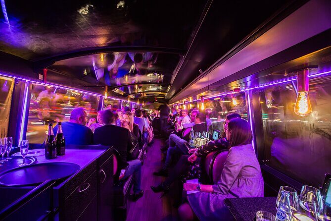 Paris 5-Course Dinner Bus Toque with Champagne from Opéra - The upstairs dining room: where the 360° views actually feel real
