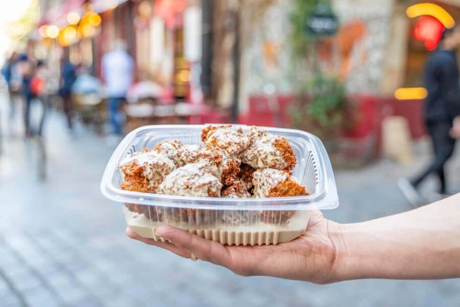 Paris: Authentic Food & Wine Tasting Tour in Le Marais - The oldest covered market stop for cheese, confiture, and wine