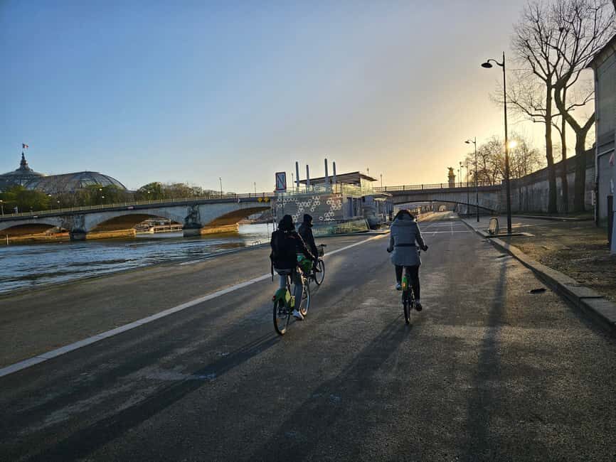 Paris Before the Crowds: Sunrise Bike Tour with Breakfast - Louvre area riding: where the day starts to feel real