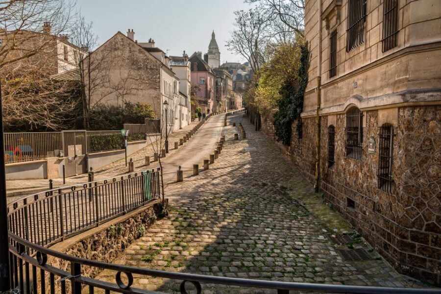 Paris: Charms of Montmartre Guided Walking Tour - Moulin Rouge to the Hill: Starting Where the Energy Is