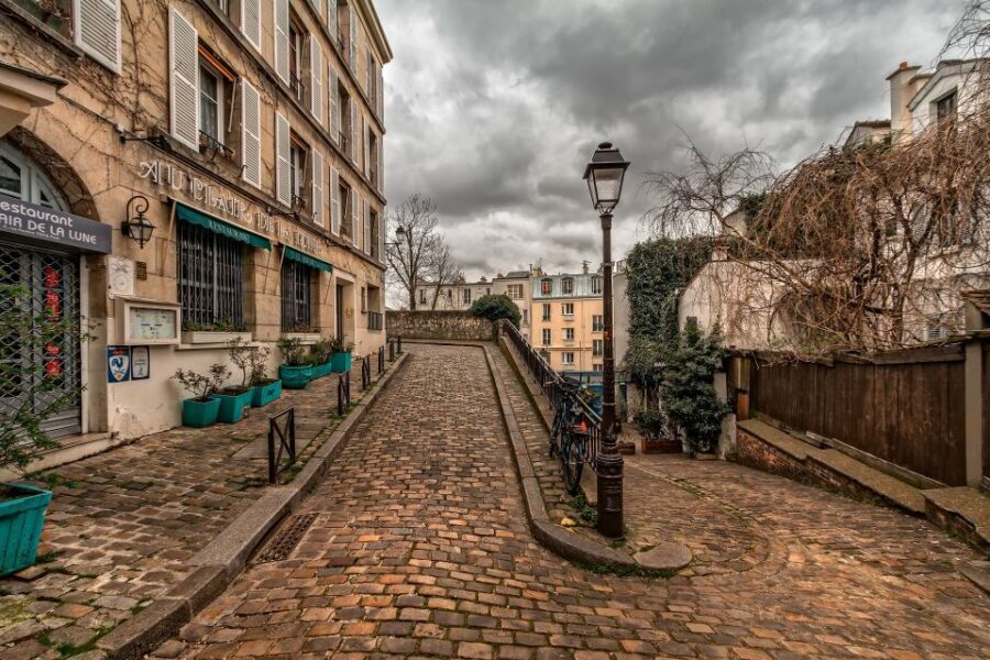 Paris: Charms of Montmartre Guided Walking Tour - Guinguette Atmosphere, an Original Windmill, and Bohemian Energy