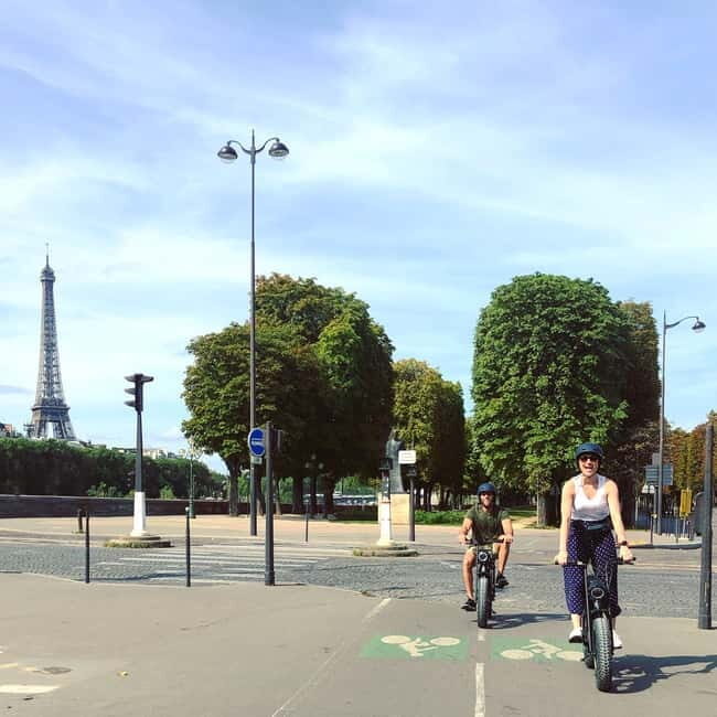 Paris: City Highlights Private Electric Bike Tour with video - Stop 3: Notre Dame Cathedral by bike—sightseeing without the crush