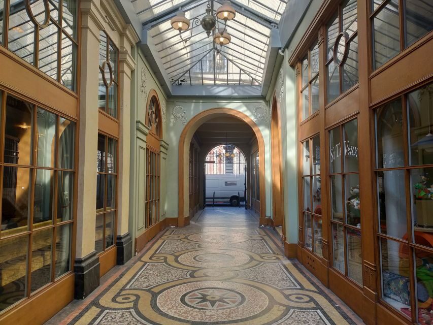 Paris: Covered Passages Walking Tour - Passage Jouffroy: Narrow, Glass-and-Iron Style, and a Wax Museum Stop