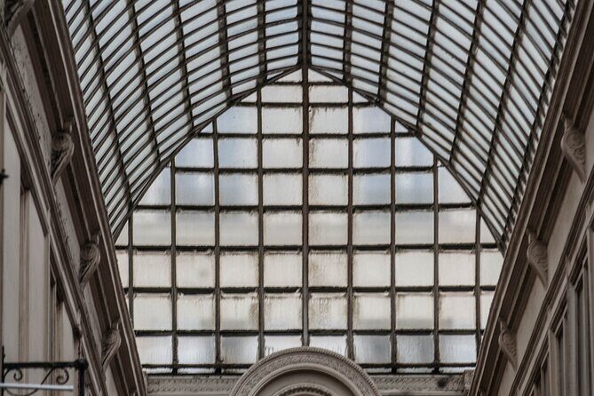 Paris Covered Passages Walking Tour plus Seine Cruise Option - Stop 1: Galerie Vivienne and the feeling of a national monument