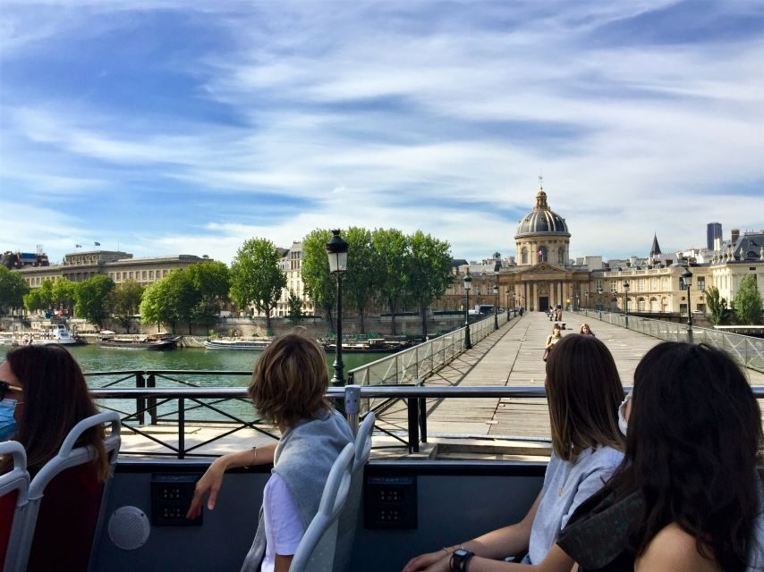 Paris: Discovery Hop-On Hop-Off and Paris by Night Tour - Audio guide reality: languages are great, but tone varies