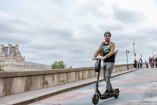 Paris E-Scooter Tour with fun & informative guide (small groups) - Notre-Dame after 2019 and Île de la Cité’s starting point