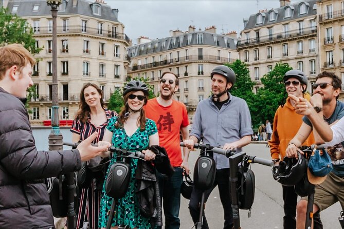 Paris E-Scooter Tour with fun & informative guide (small groups) - Le Marais pit stop, Grand Palais, and a fun Seine stretch
