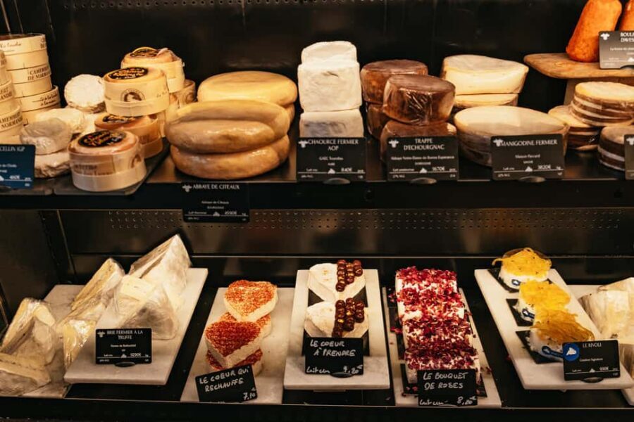 Paris: Gourmet Food Tour with Over 10 Tastings and Wine - Cheese shop to wine bar: charcuterie, two glasses of French wine, and real pairing time