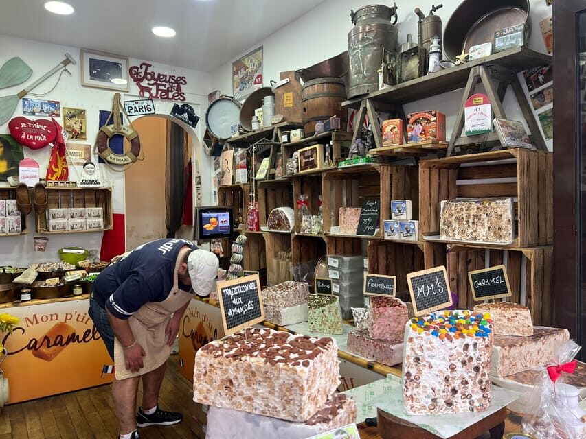 Paris: Guided Montmartre Walking Tour with Food & Wine - What the guide actually does for your experience