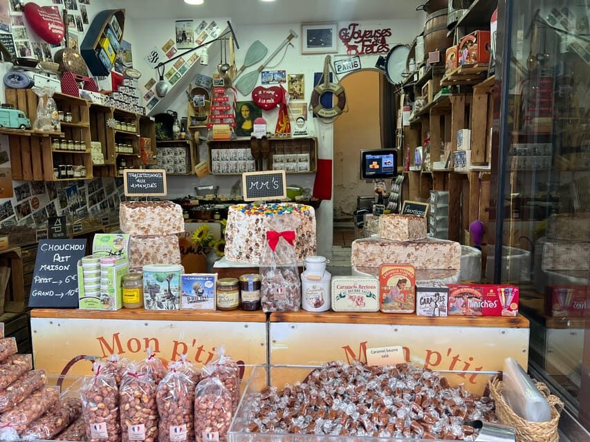 Paris: Guided Montmartre Walking Tour with Food & Wine - Sweet tastings: macarons, chouquettes, and toffee