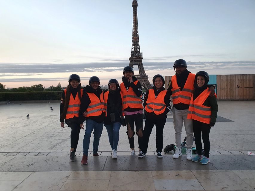 Paris: Guided Segway Tour Paris by Night - Getting ready at Place de Fontenoy: helmet, rain gear, and a real training block