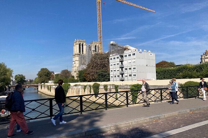 Paris Île de la Cité and Notre-Dame Walking Tour With Crypt - The Court of Appeal and Tour de l’Horloge: time and justice in stone