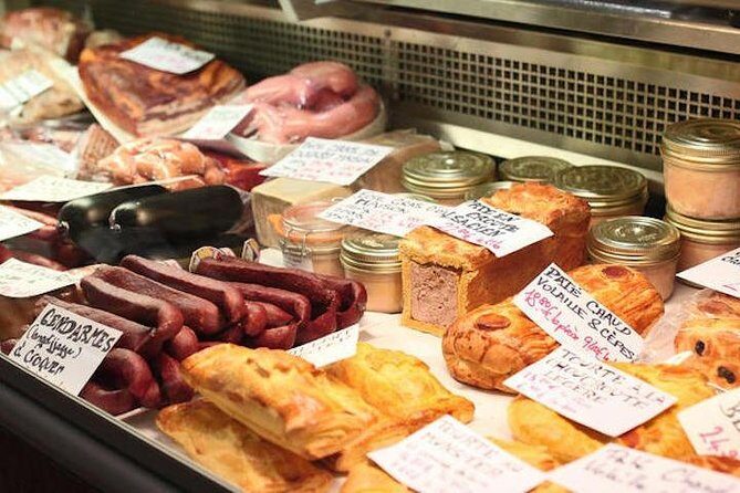 Paris Local Market & Bastille District Food Tasting Tour - Meeting point at Place de la Bastille: get there early, eat smarter
