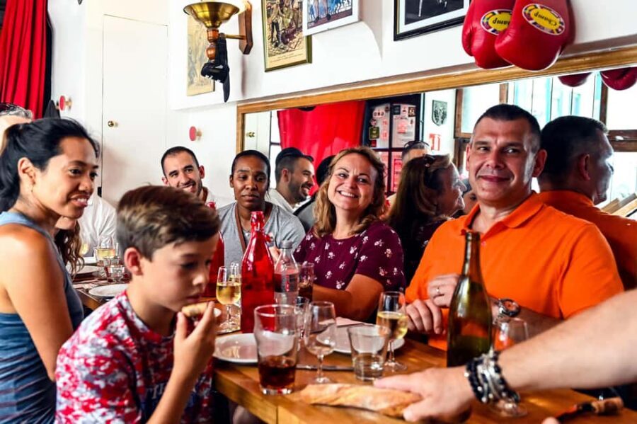 Paris: Montmartre Food Tasting Walking Tour with Secret Dish - What you get for $148: tastings, wine, and a real meal value