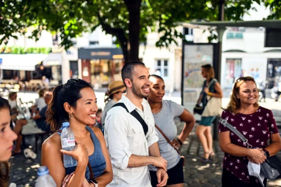 Paris: Montmartre Food Tasting Walking Tour with Secret Dish - Crêpe versus galette and a boulangerie bread stop
