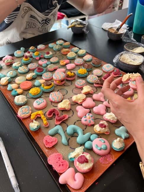Paris: Montmartre Macaron Baking Workshop - Walking into Maca’Rong on Rue Legendre