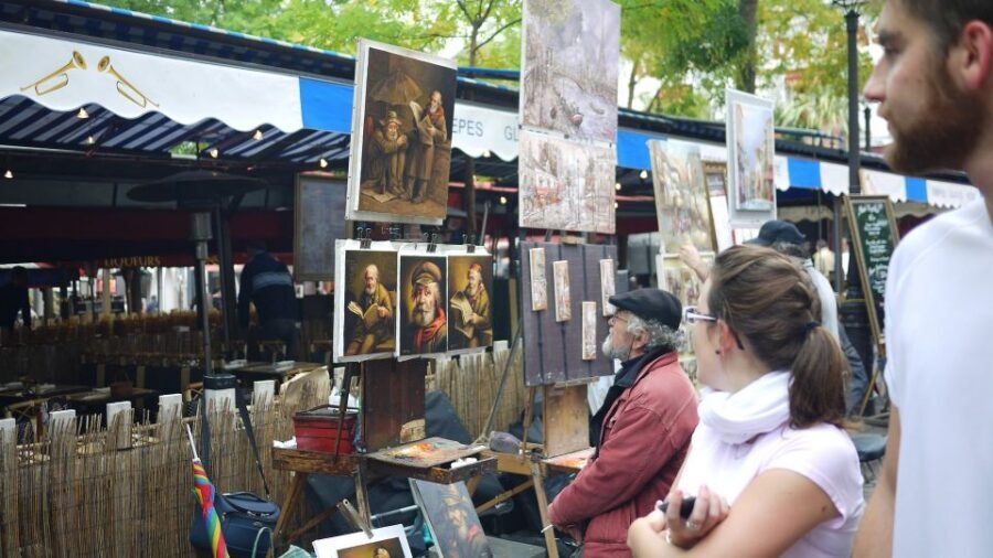 Paris: Montmartre Private Guided Tour & River Cruise Option - Moulin Rouge from the foot of the hill: iconic, but keep your expectations sane